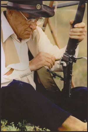 Austin Monk reloading Sharps rifle at Virginia City Black Powder Shoot